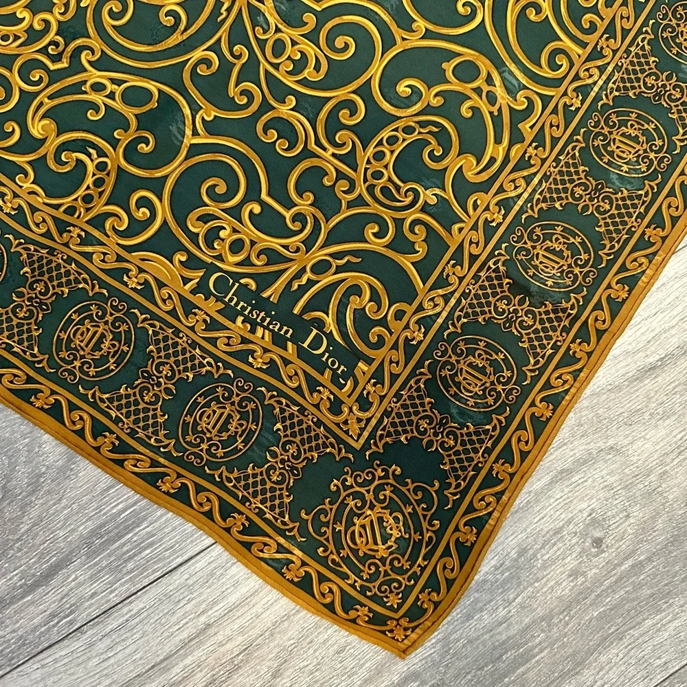 Vintage Dior silk scarf with hidden logo 35x35”rolled hem. Tag on side.